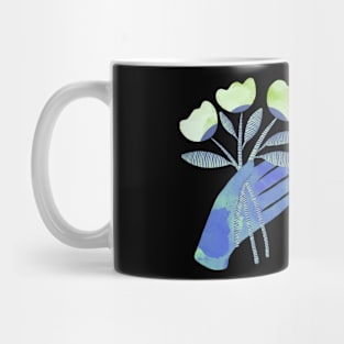 Blue hands with green flowers for yous for you on black background Mug